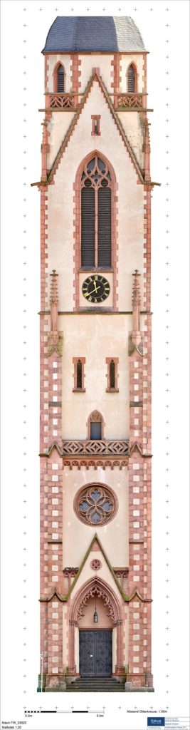 Neo-Gothic church tower surveyed for architectural preservation using drone photogrammetry services at church site