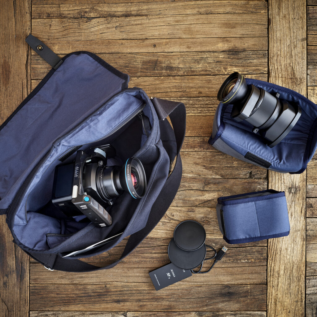 The XT minimalist camera in a photography bag