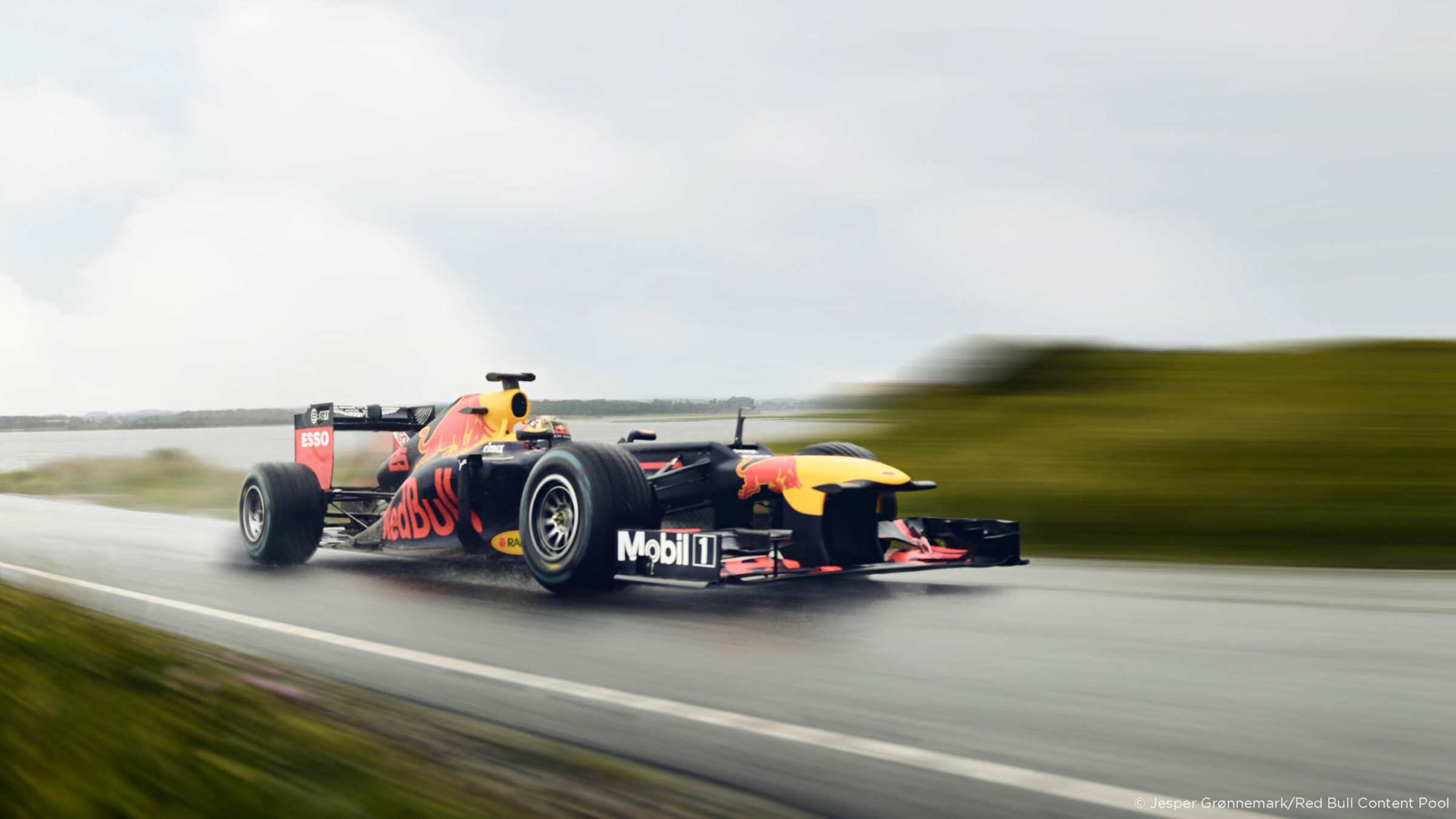 Race car speeding down the track during a photoshoot
