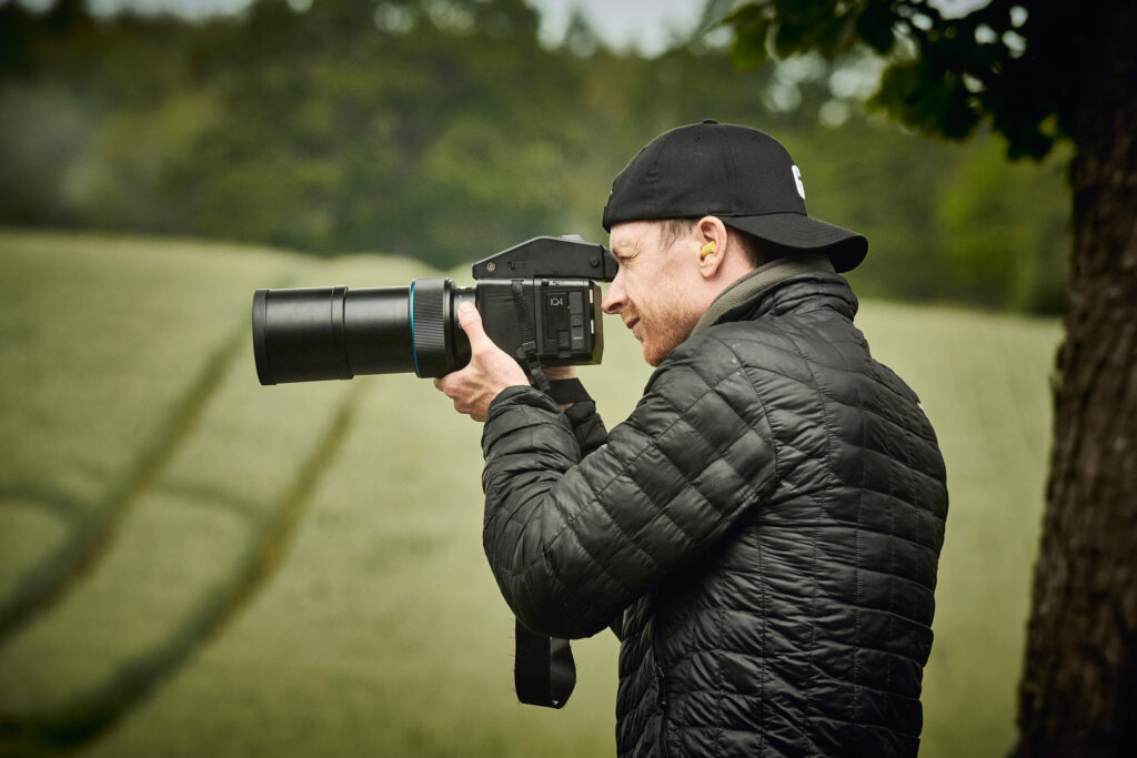 Photographer setting up for a race car photoshoot