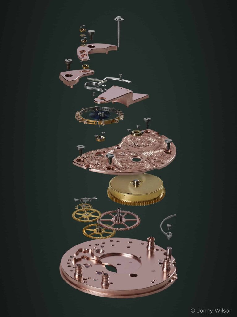 Jonny Wilson using a medium format camera to photograph an exploded watch movement