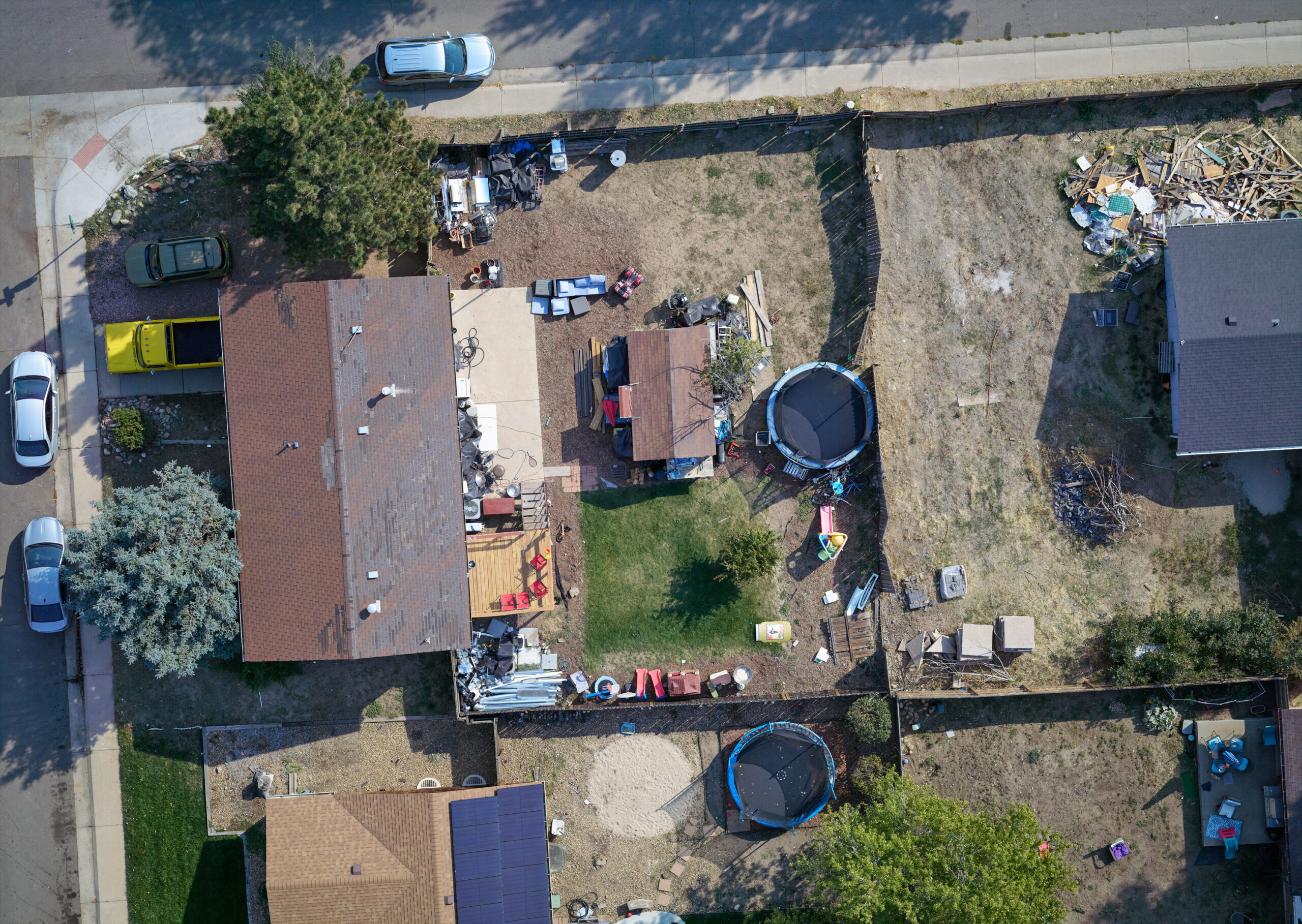 Drone inspecting urban area for hail damage with Phase One P5
